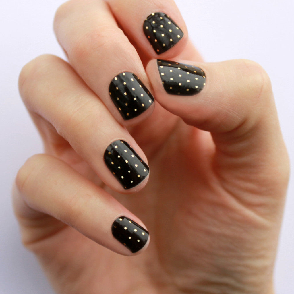 Black Nails with Gold Accents
